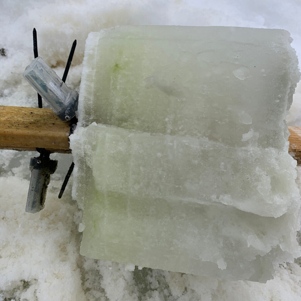 This green ice is a block that was extracted around temperature sensors the team placed in the hypersaline lakes in British Columbia’s Cariboo Plateau (in Sept. 2018) to get a temperature record of the ice and brine as it froze.